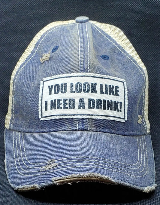 You Look Like I Need A Drink Snapback Female Trucker Style hat Round The Mountain Gift Shop